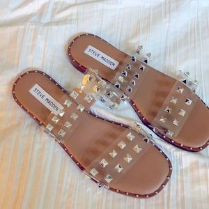 Steve Madden clear studded sandals.